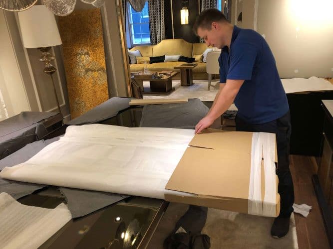 Professional moving crew handling a full villa relocation